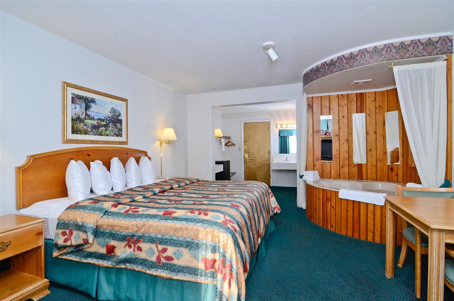 Magnuson Grand Pioneer Inn And Suites Escanaba Chambre photo